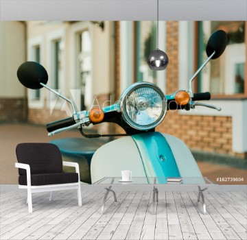 Picture of Close up view retro scooter parked on city street